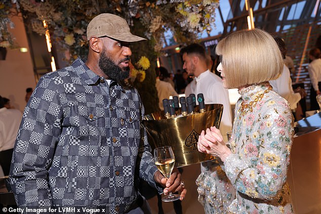 The Vogue editor was later seen chatting intensely with American basketball player LeBron James.