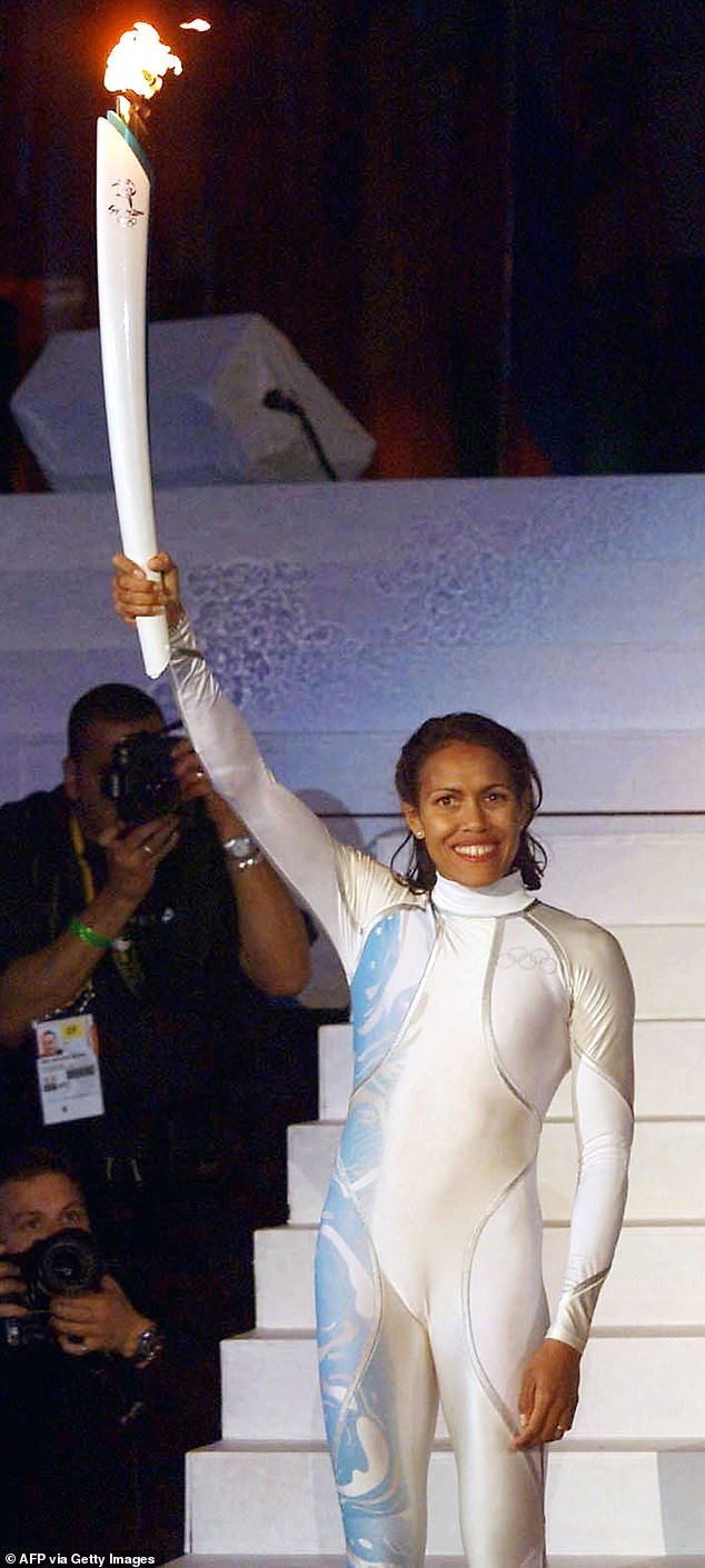 Incredibly, a similar scene occurred at the 2000 Sydney Olympics: Australian track star Cathy Freeman (pictured) was given the honour of lighting the cauldron – the problem was that the iconic rings were positioned upside down around her suit.