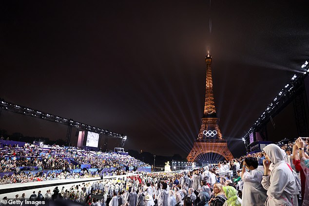 The star-studded ceremony took place on the River Seine in Paris on Friday evening.