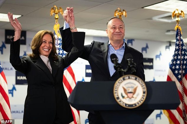 Vice President Kamala Harris and second gentleman Doug Emhoff are seen at her campaign headquarters in Wilmington, Delaware, on Monday.