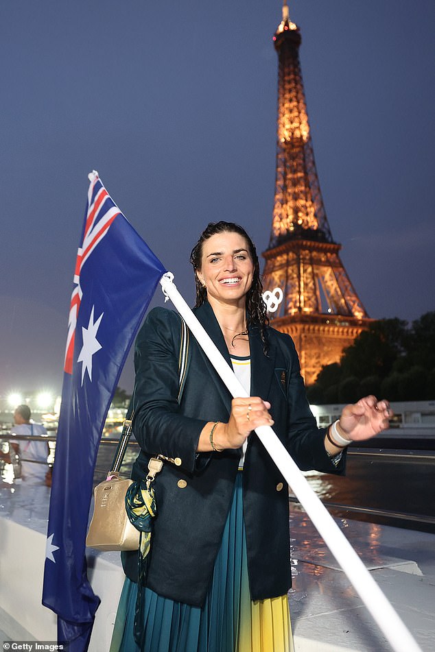 Jessica Fox (pictured as Opening Ceremony flag bearer) will compete in the women's kayak singles heats from midnight AEST on Saturday.