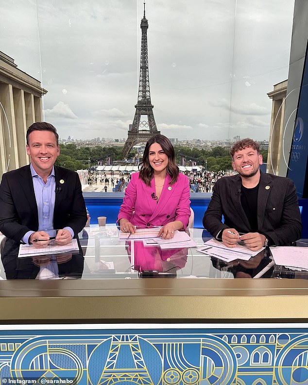 The veteran journalist couldn't wipe the smile off her face as she posed dramatically in front of one of France's most famous landmarks, just hours before attending the Olympic Games opening ceremony. Pictured with co-stars James Bracey and Dylan Alcott