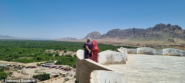 This image shows visitors in southern Afghanistan. James says many people 