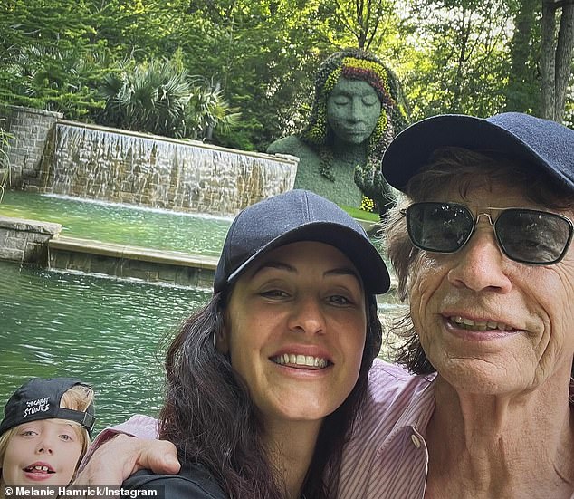 In another selfie, they posed beaming and happy with Deveraux, who proudly sported a black Rolling Stones baseball cap.