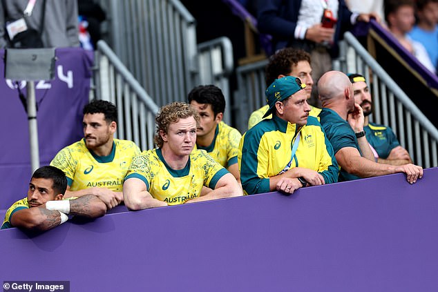 The Australian team's faces are dejected after being denied a bronze medal in a disastrous match.