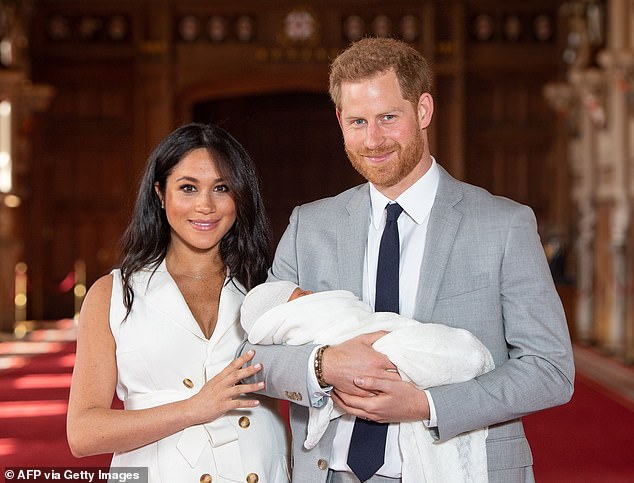 Prince Harry and Meghan with Archie in May 2019, then a newborn son