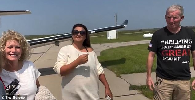 The tragic clip shows the family standing in front of the ill-fated plane before it crashed in a remote area of ​​northeastern Wyoming (pictured right: pilot Larry Haynie)