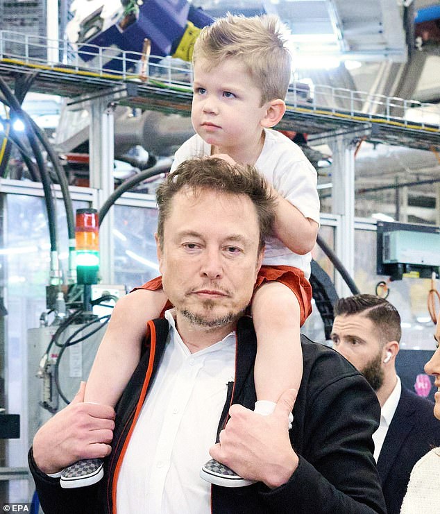 Garossin claimed that X was supposed to be with Grimes, whose real name is Claire Boucher, but that Musk took him to France. Pictured: Musk and X tour a Tesla plant in Austin, Texas, in 2023