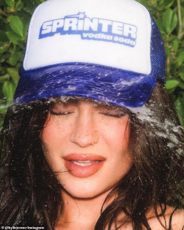 There was a photo of Kylie with her eyes closed as water poured down her face.