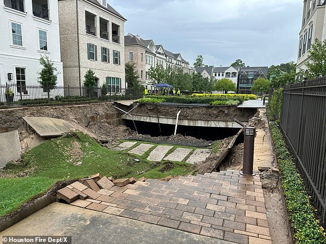 Photos from the Houston Fire Department show a grassy area and a nearby sidewalk sank about 10 feet in the collapse, which appeared sudden.