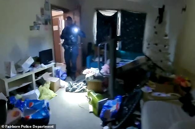 Body camera footage shows mountains of trash throughout the apartment and court documents describe the location as 