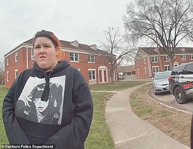 Muballigh is arrested outside her apartment building after police persuade her to return.