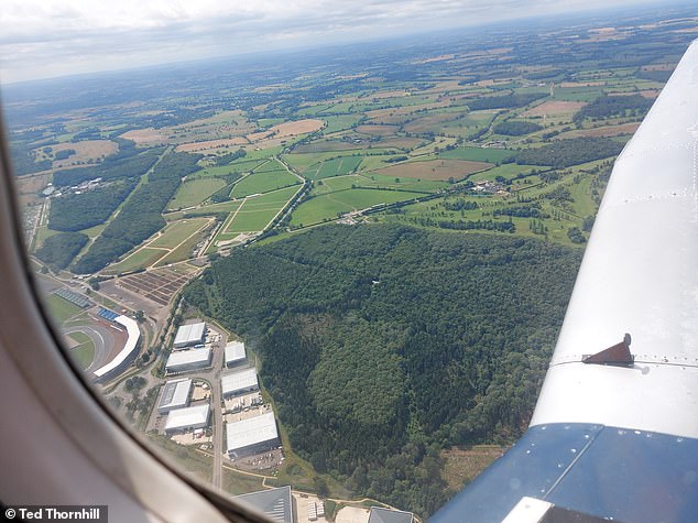 Ted flies over the Silverstone circuit (above, bottom left) on his way to Oxford and back.