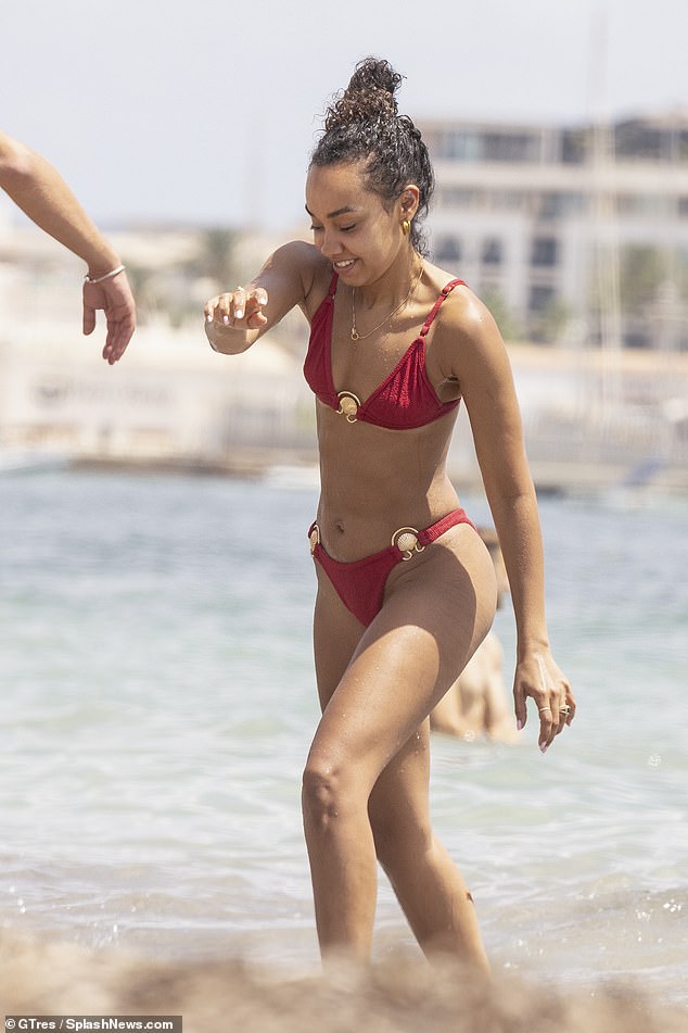 Letting her long, dark hair loose, Leigh-Anne went for a swim in the ocean to cool off from the Spanish sun.