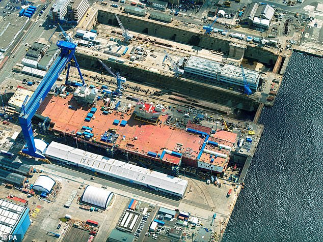 The main dry docks at Babcock Marine's Rosyth shipyard, with HMS Queen Elizabeth