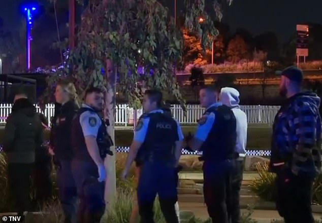 New South Wales Police at the scene on Saturday night after the man attacked an officer.