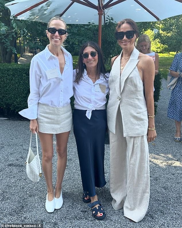 The Duchess of Sussex, who was seen alongside designer Misha Nonoo and cosmetics boss Bobbi Brown, wore a vest and trousers combination by St. Agni.