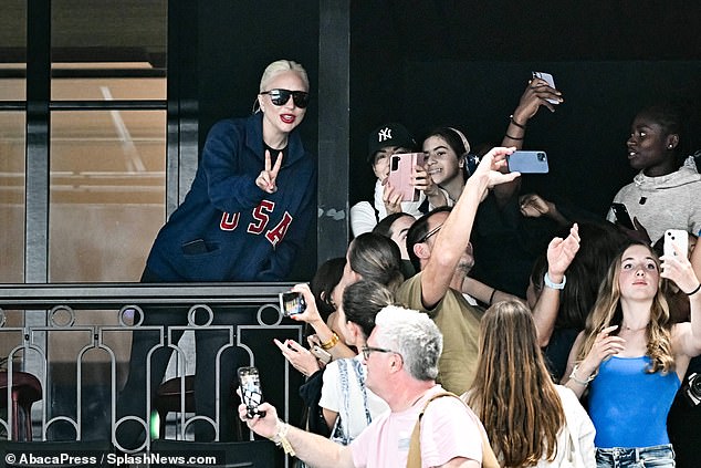 Her fans were absolutely delighted to see her as they posed for snaps with her in the background in the stands.