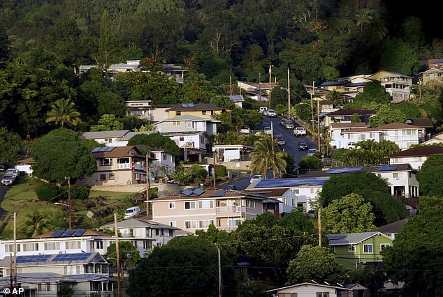 As for the state's real estate market, it has become difficult for the housing rate to keep up with the influx of residents, not to mention the numerous tourists who travel there. (pictured: a neighborhood of single-family homes in Honolulu)