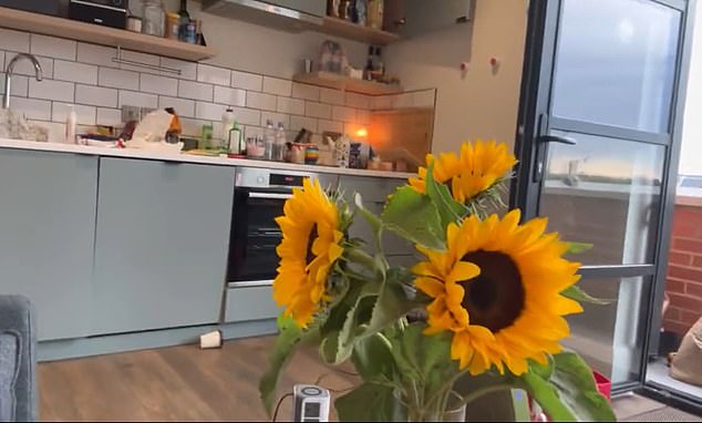 She said she was happy to be home in London and showed fans sunflowers from a friend.