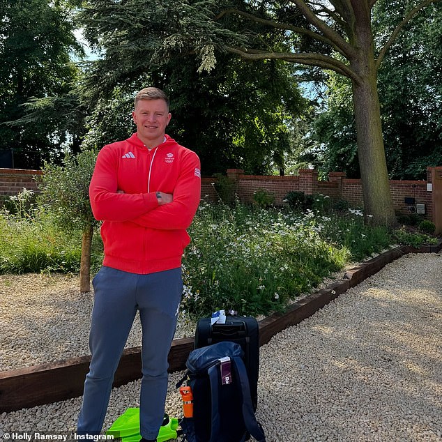 In a snapshot, the athlete posed in his full sports kit, including his official Paris Olympics hoodie and bags - the swimmer will appear in his first race tomorrow.