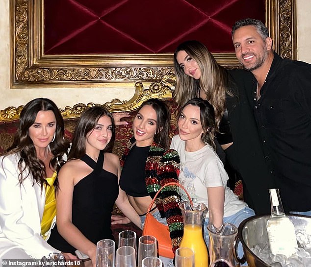 Kyle and Mauricio pictured with their daughters Alexia, Sophia, 24, Portia and Farrah, 35.