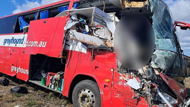 The crumpled remains of a camper van were embedded in the front of the Greyhound bus after the crash (pictured)