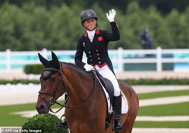 Canter waves to the crowd at Lordships Graffalo after competing in dressage on Saturday.