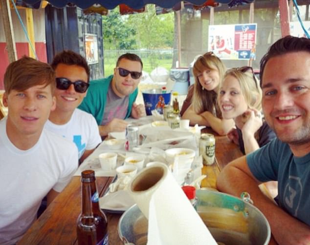 Dustin and Tom pictured with friends on their first anniversary in 2014