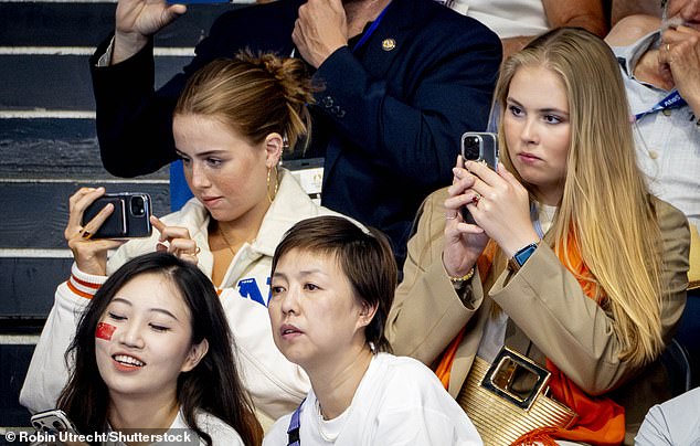 Meanwhile, just like any other youngsters, the two princesses were seen taking out their mobile phones to capture the action.