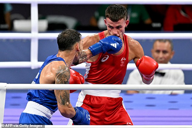 Garside, 27, appeared dejected after the fight and was emotional as Kovac celebrated his victory.