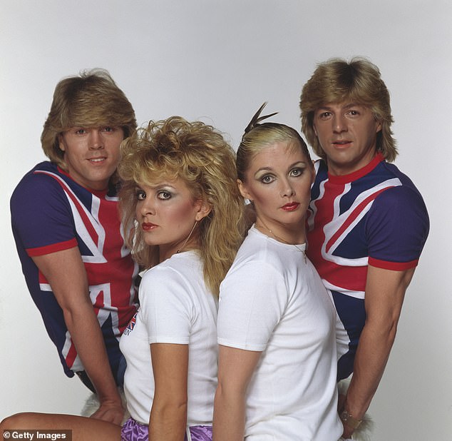 The band, who rose to fame after winning Eurovision in 1981, currently consists of (l-r) Mike Nolan, Jay Aston, Cheryl Baker; pictured with former member Bobby G