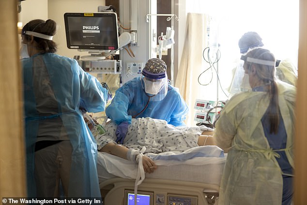 A team of nurses and doctors care for a patient at St. Cloud Hospital in St. Cloud, Minnesota, which is ranked as having the best health care system in the country.