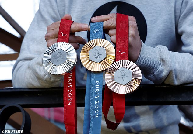 The athletes' medals feature a hexagonal piece of iron taken from the Eiffel Tower embedded in each gold, silver and bronze medal.