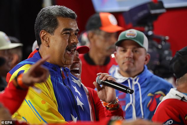 Venezuelan President Nicolas Maduro (left) delivers a speech after the results of the presidential election were announced in Caracas, Venezuela, July 29.