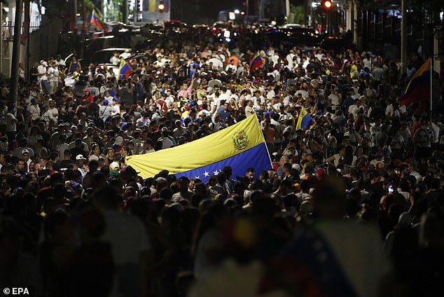 Venezuelan citizens gather to await the results of the presidential elections