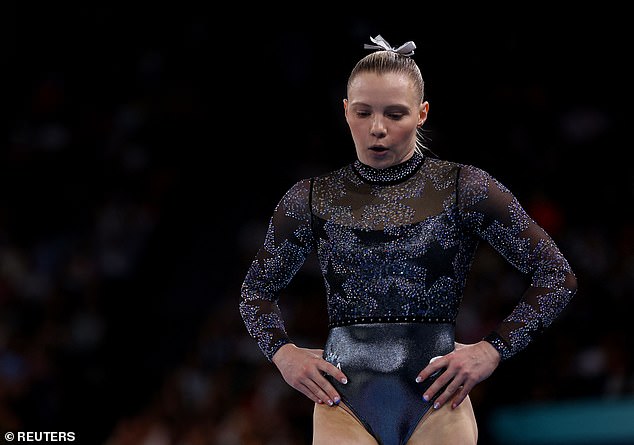 USA's Jade Carey reacts after her floor exercise performance