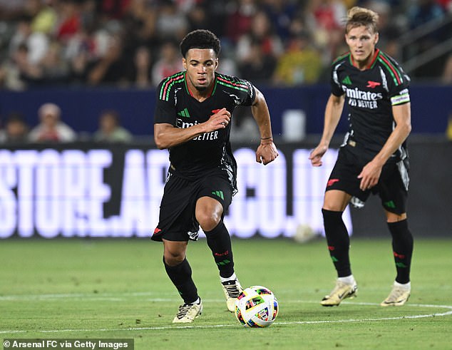 Ethan Nwaneri (left) has excelled in pre-season and the youngest player in Premier League history could force his way into the first team this season.