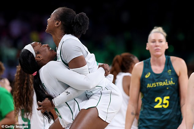 Elizabeth Balogun and Adebola Adeyeye of Team Nigeria celebrate victory over the Opals at their opening Olympic Games