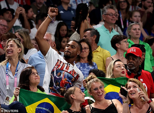 Simone Biles' husband Jonathan Owens was spotted celebrating in Paris on Tuesday