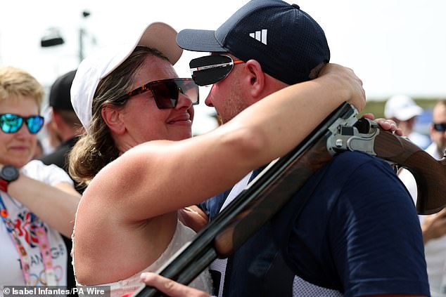 Hales became emotional after his win as he celebrated with his wife Charlotte Kerwood (left)