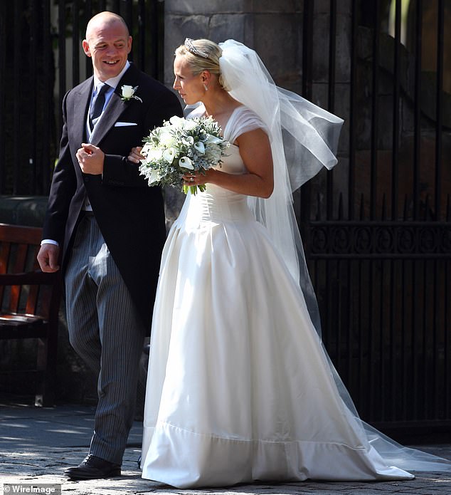 Zara Phillips and Mike Tindall after their wedding at Canongate Kirk on July 30, 2011 in Edinburgh