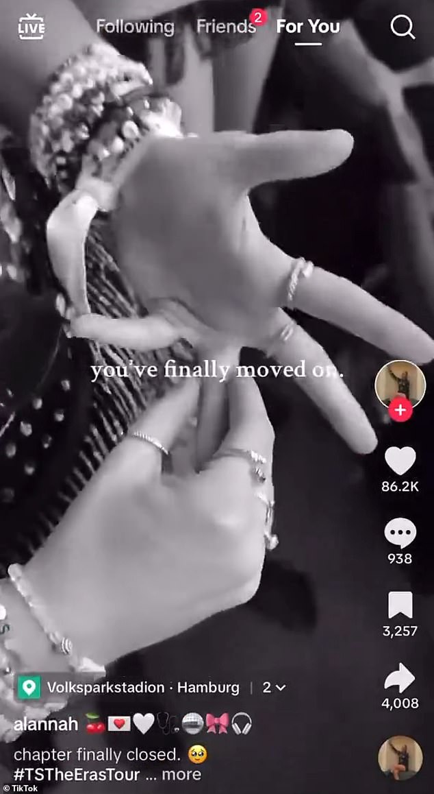 Someone filmed her removing a band from her left ring finger.