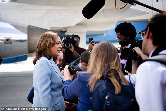 Kamala Harris speaks with journalists