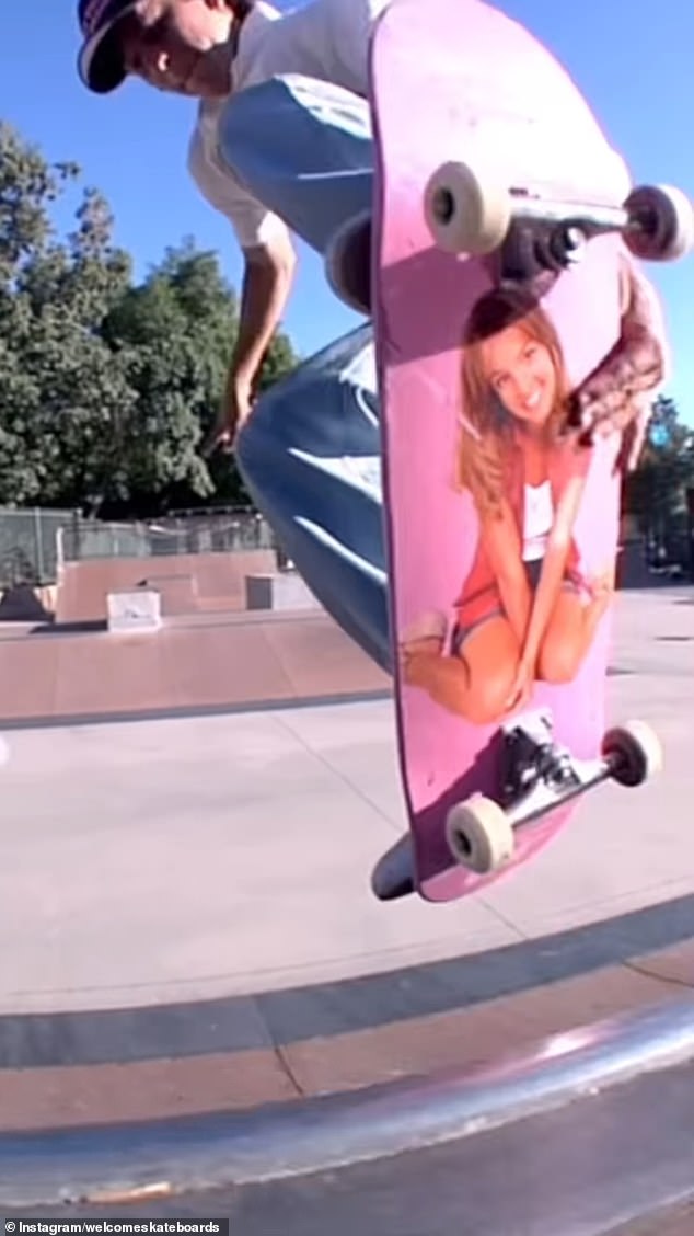 An image of Spears from the cover of her 1999 debut album ...Baby One More Time is seen on one of the skateboards.