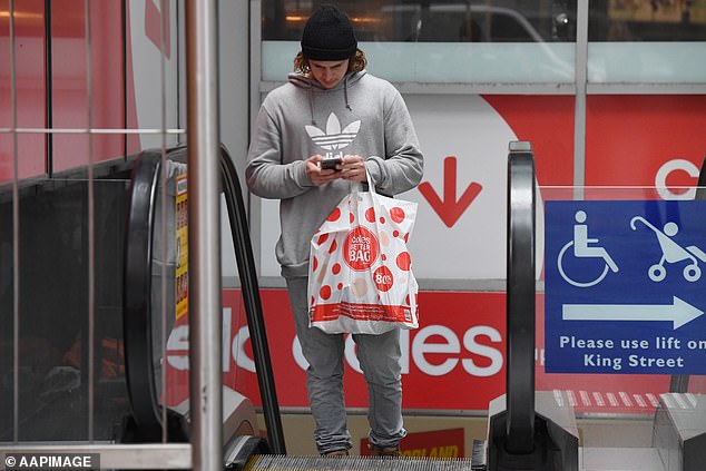 The latest figures have sparked fears that the RBA could push rates up, even though borrowers are already grappling with the most aggressive increases since the late 1980s (pictured, a Coles shopper)