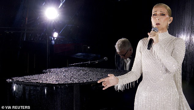 Marney's hair and makeup look is very different to Celine's, with her hair slicked back and the sparkly dress she wore to the recent Paris Olympics opening ceremony. Pictured: Celine Dion performing at the Paris 2024 Olympics opening ceremony