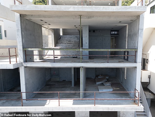 Photos taken in July revealed that the glass windows had been removed, leaving a clear view of empty concrete walls and floors.