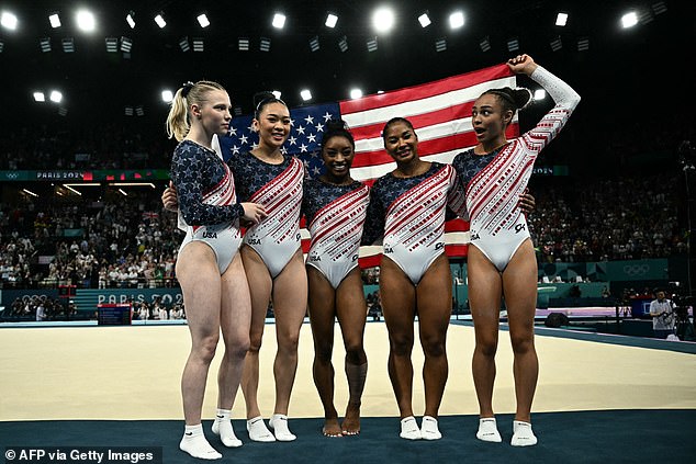 Simone Biles and Sunisa Lee led Team USA to its first Olympic gold in artistic gymnastics since 2016, as the Americans easily beat their rivals. (pictured: U.S. women's artistic gymnastics team)