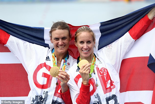 Gold medallists Helen Glover (right) and Heather Stanning (left) of Great Britain pose for photographs after the medal ceremony in Rio, 2016.